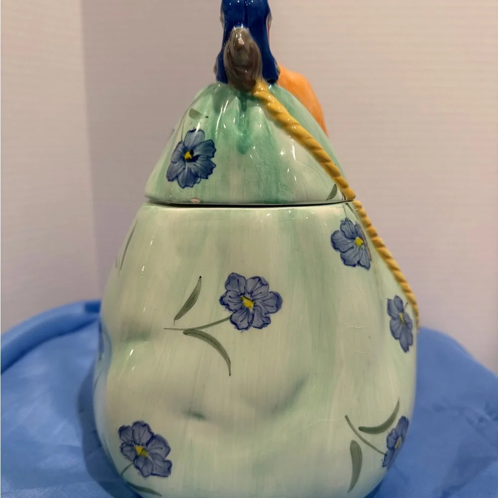 Vintage ceramic cookie jar with lift off lid